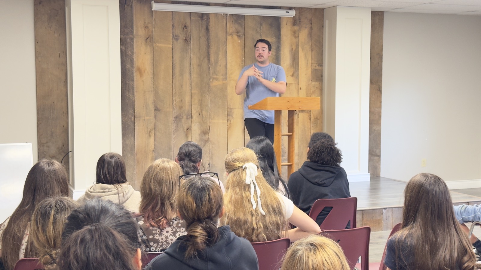 Pastor Austin preaching to the youth group