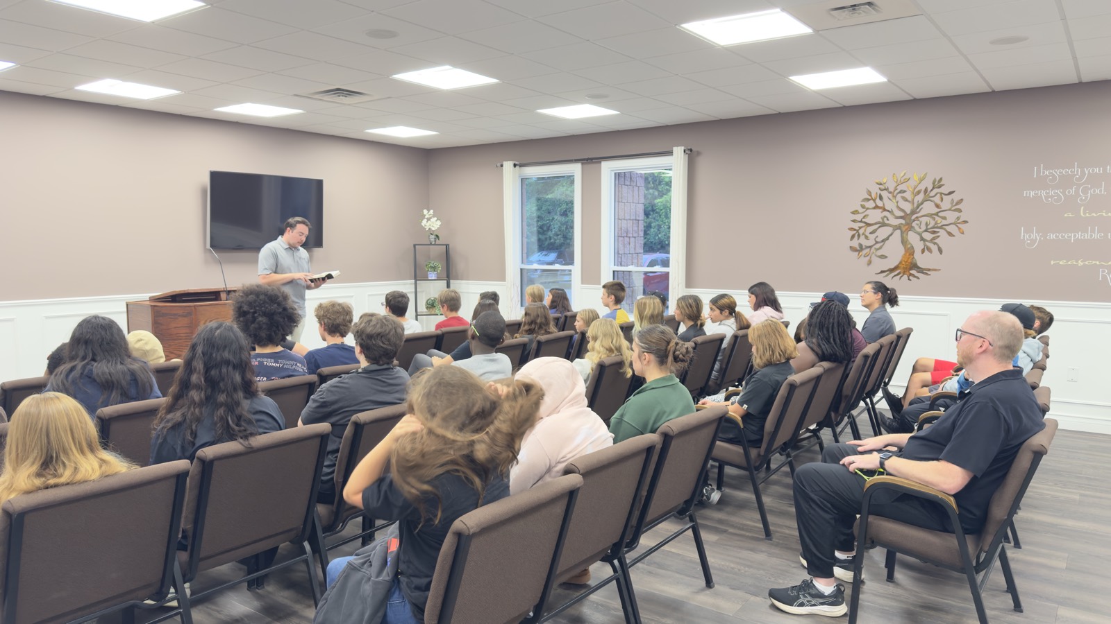 A room full of teens listening on a Wednesday night