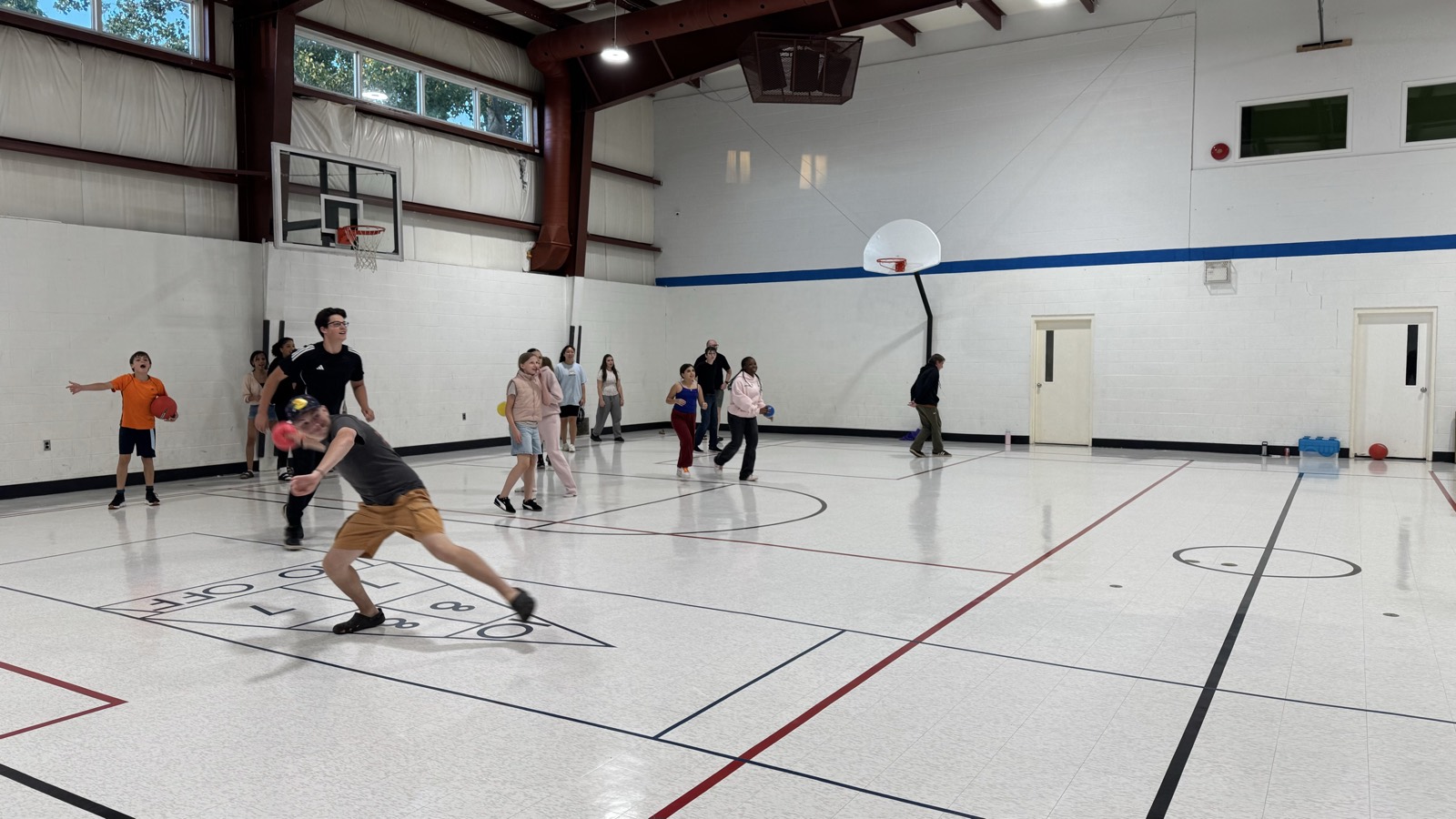 A game of dodgeball across the gym on a Wednesday night