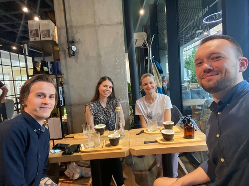 Maximize team members relaxing outside