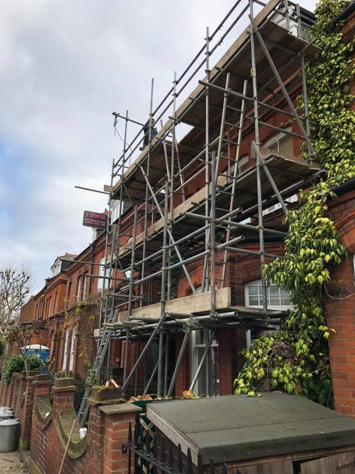 scaffolding on brick house