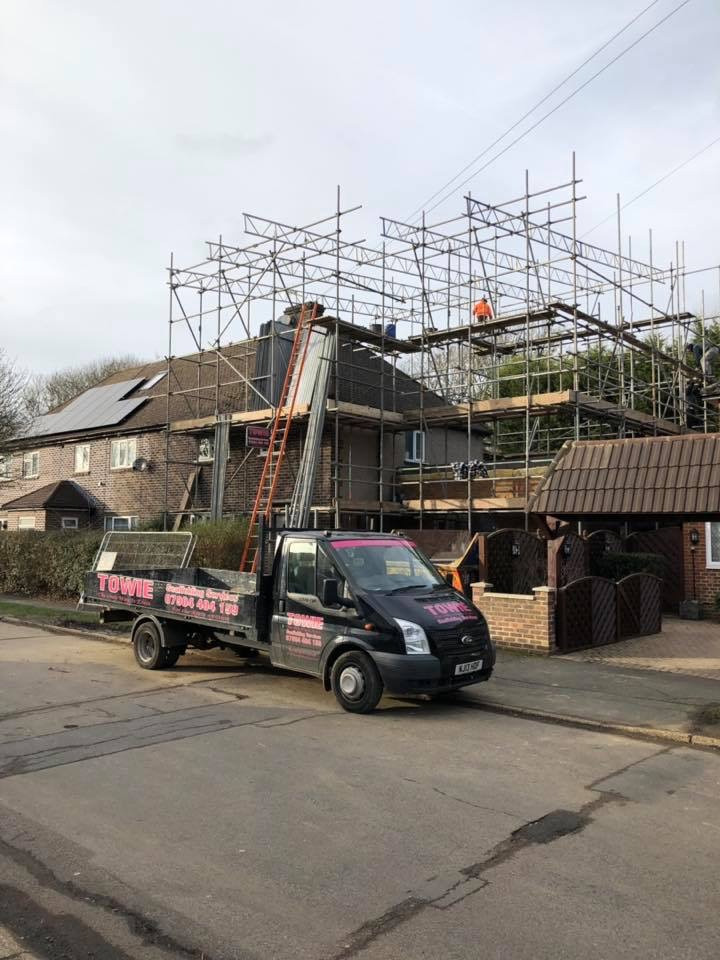 scaffolding with black van