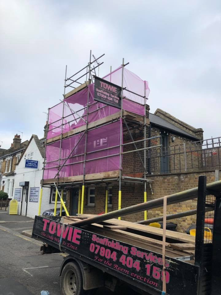 scaffolding on street house
