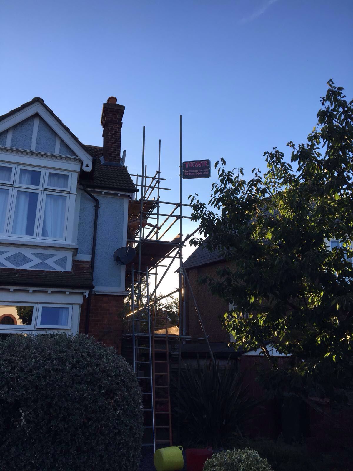 scaffolding on side of house