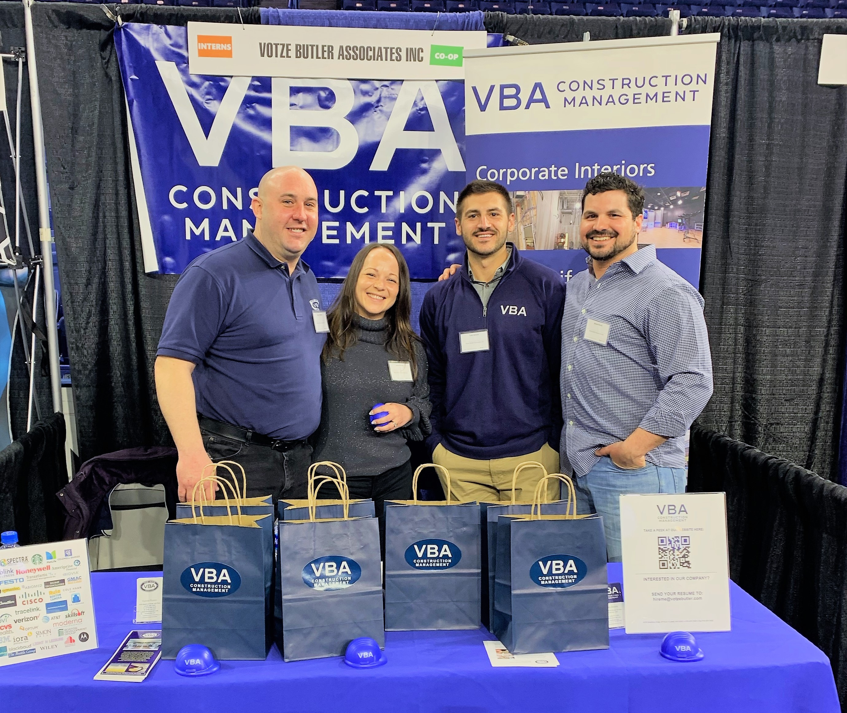 Staff on bikes participating in charity race