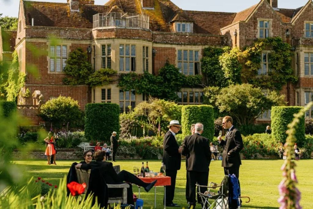 Guests enjoying the gardens during the interval at the Glyndebourne Opera Festival in Sussex, England.