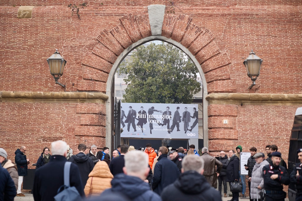 Crowds arriving at Pitti Uomo in Florence through the entrance of Fortezza da Basso.