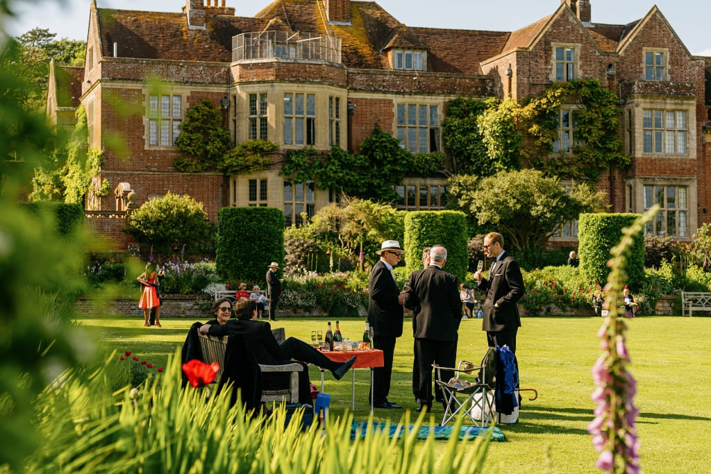 Guests enjoying the gardens during the interval at the Glyndebourne Opera Festival in Sussex, England.