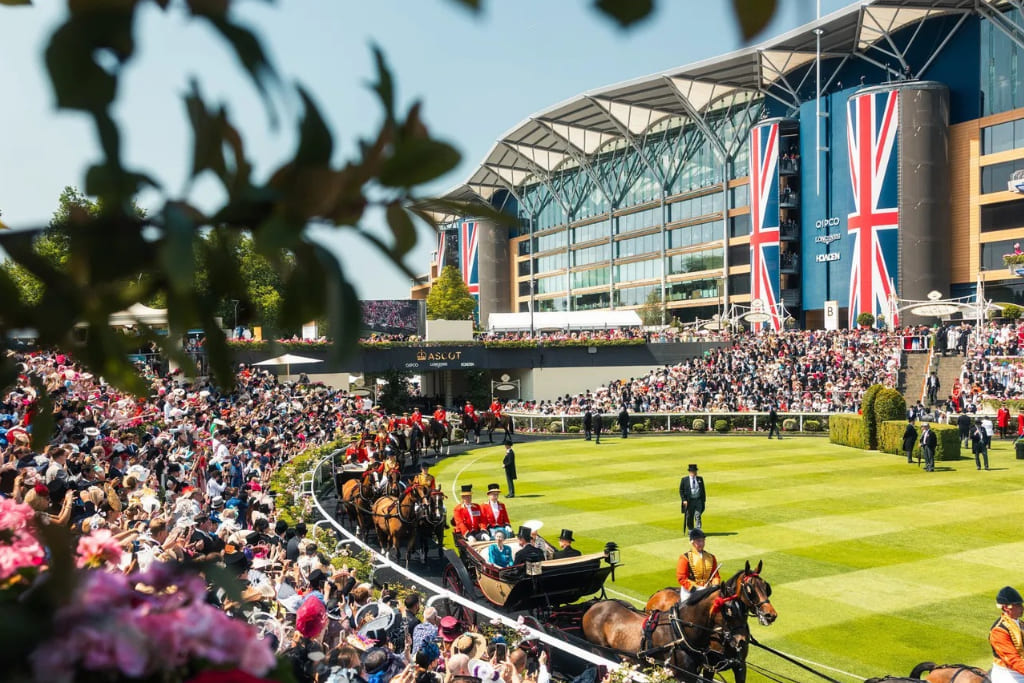 Spectators attending Royal Ascot in the Windsor Enclosure during a summer race day at Ascot Racecourse.