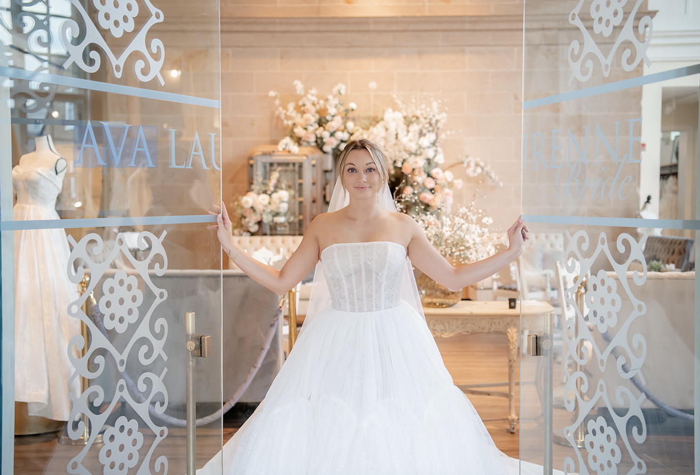 Bride trying on wedding dresses at one of the top bridal shops in Fredericksburg Virginia