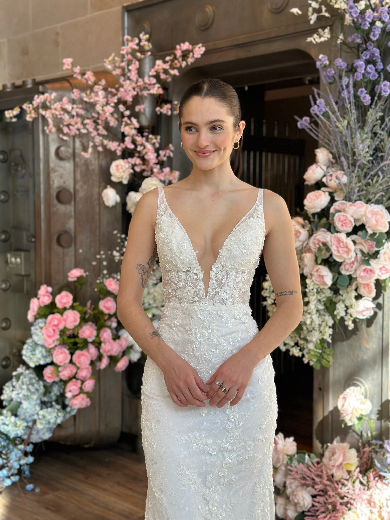 Minimalist satin fit and flare wedding dress at luxury Fredericksburg bridal shop