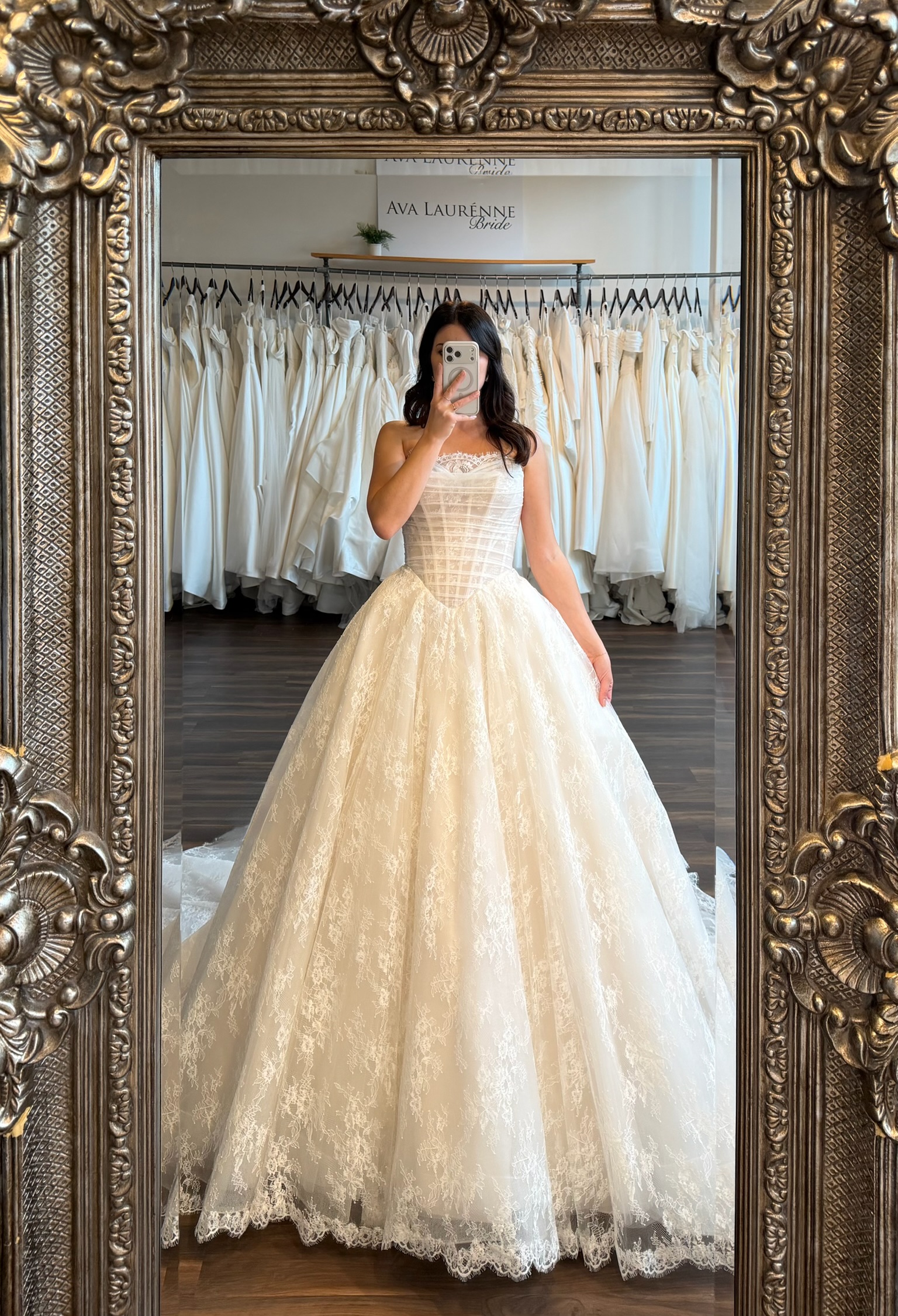 Minimalist floral jacquard ball gown wedding dress mirror selfie at Fredericksburg bridal shop