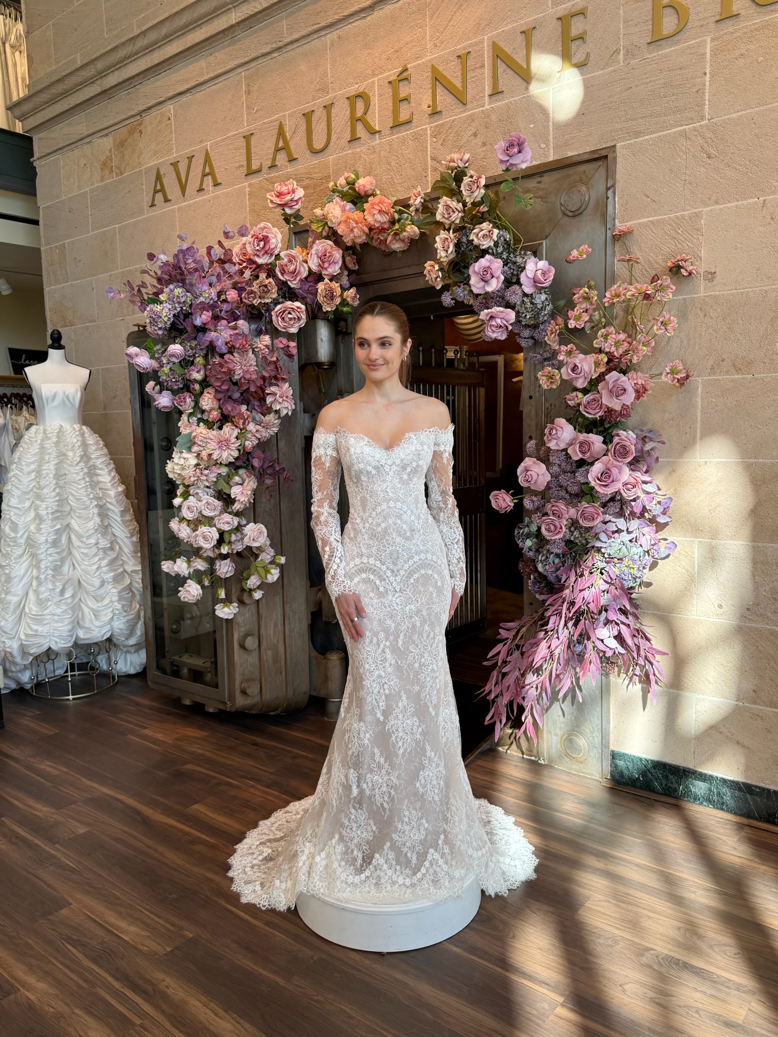 Modern off the shoulder wedding dress combining timeless elegance and contemporary style