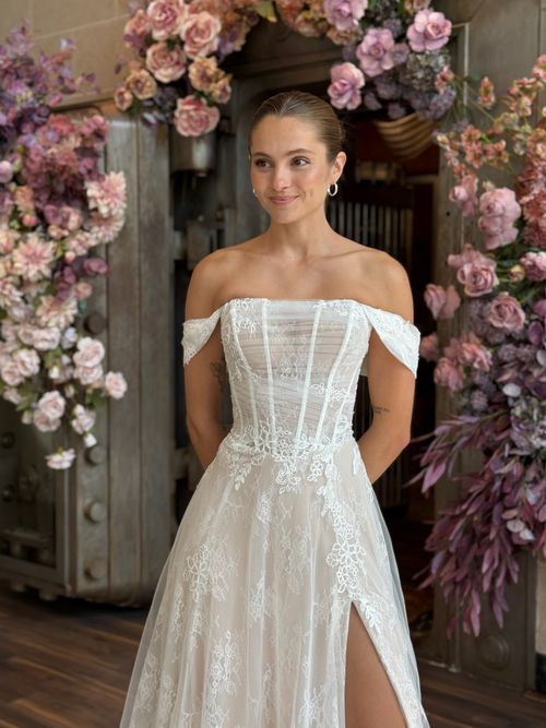 Romantic off the shoulder wedding dress with floral embroidery at Ava Laurénne Bride in Virginia