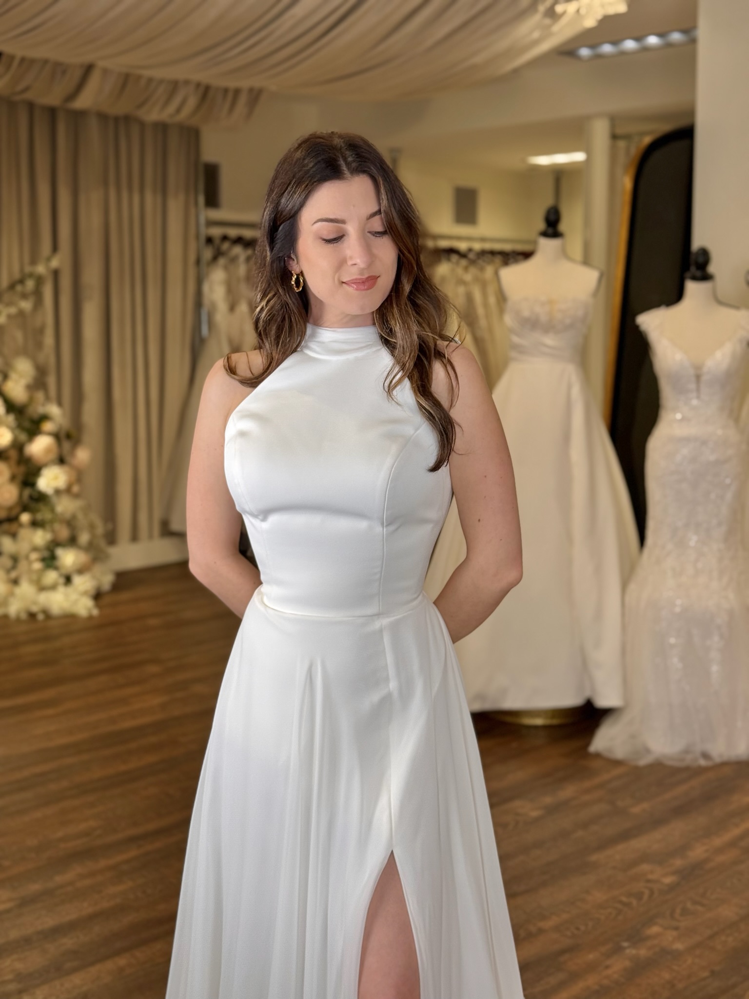 High neckline wedding dresses at Ava Laurénne Bride in Fredericksburg Virginia featuring lace, long sleeves, and timeless bridal elegance