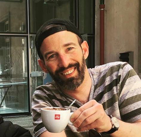 Headshot of Peter Peśek.