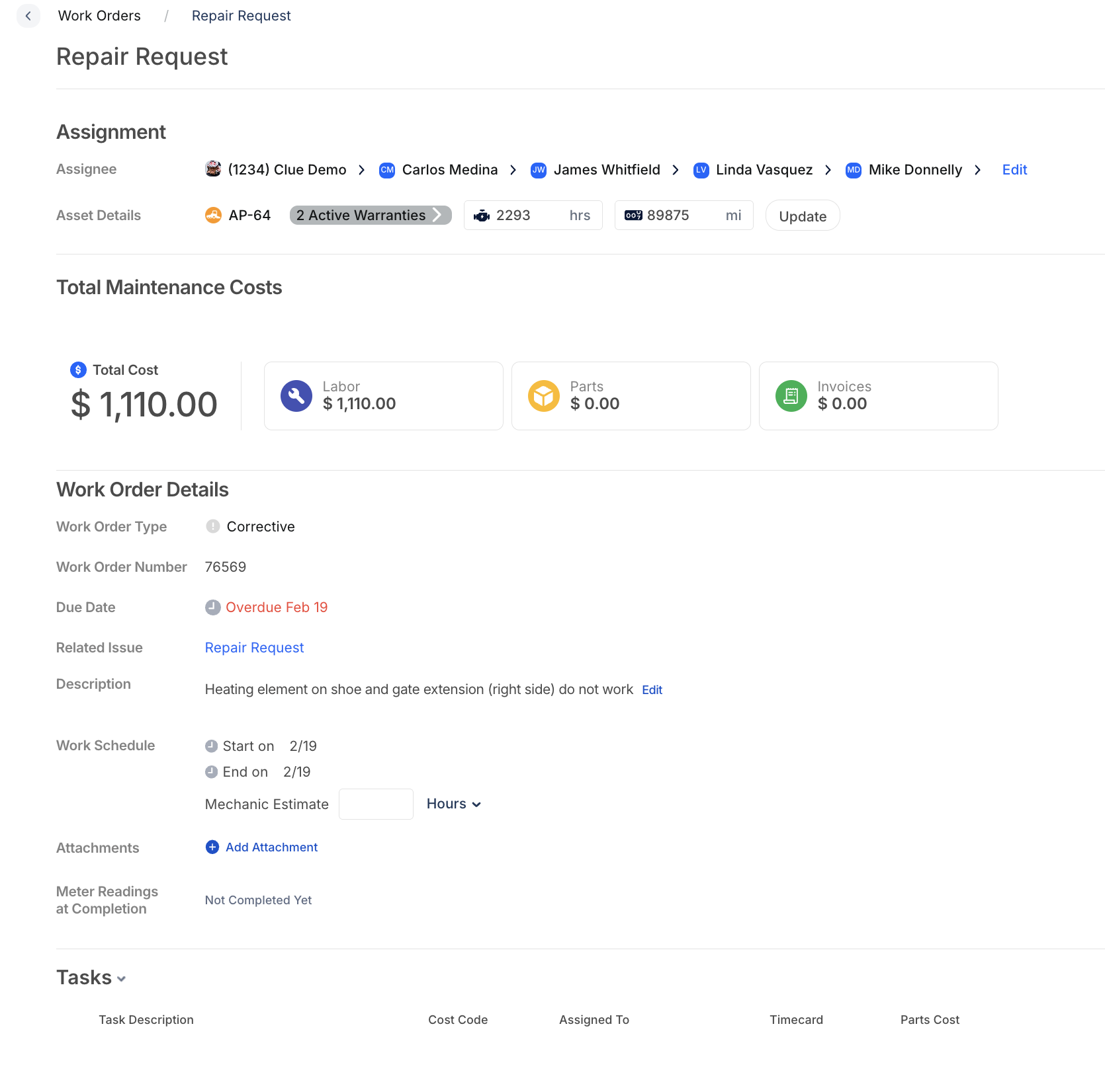 Work order showing 2 Active Warranties badge next to asset details