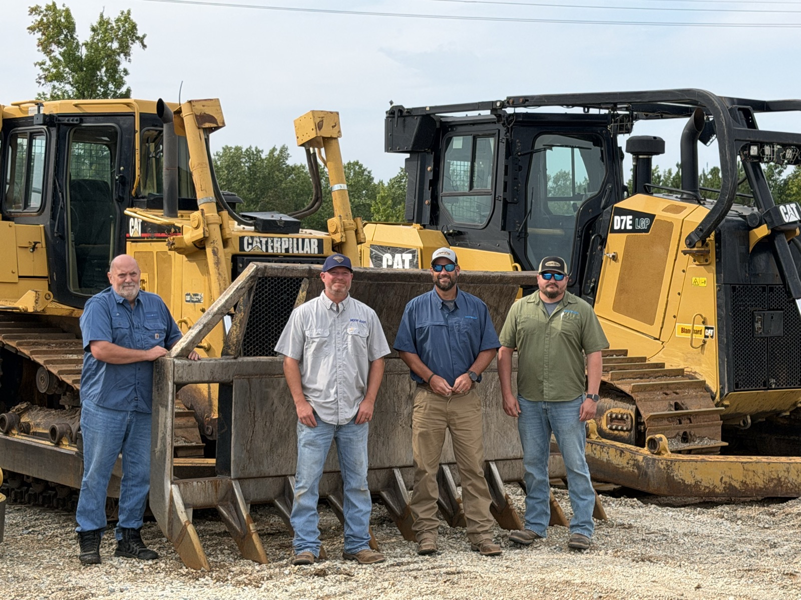 Moorhead fleet and shop team in front of Caterpillar dozers in Blacksburg, South Carolina