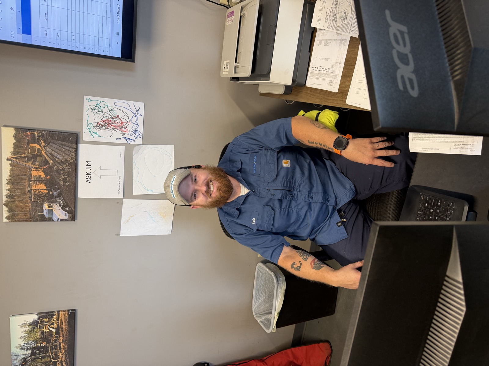 Moorhead service writer at his desk running work orders in Clue