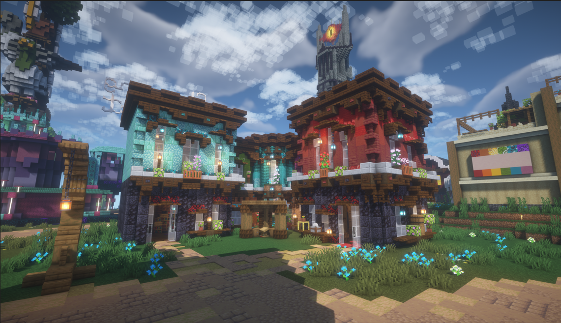 Colorful two-story Minecraft buildings with flowers and lamp posts under a bright cloudy sky.