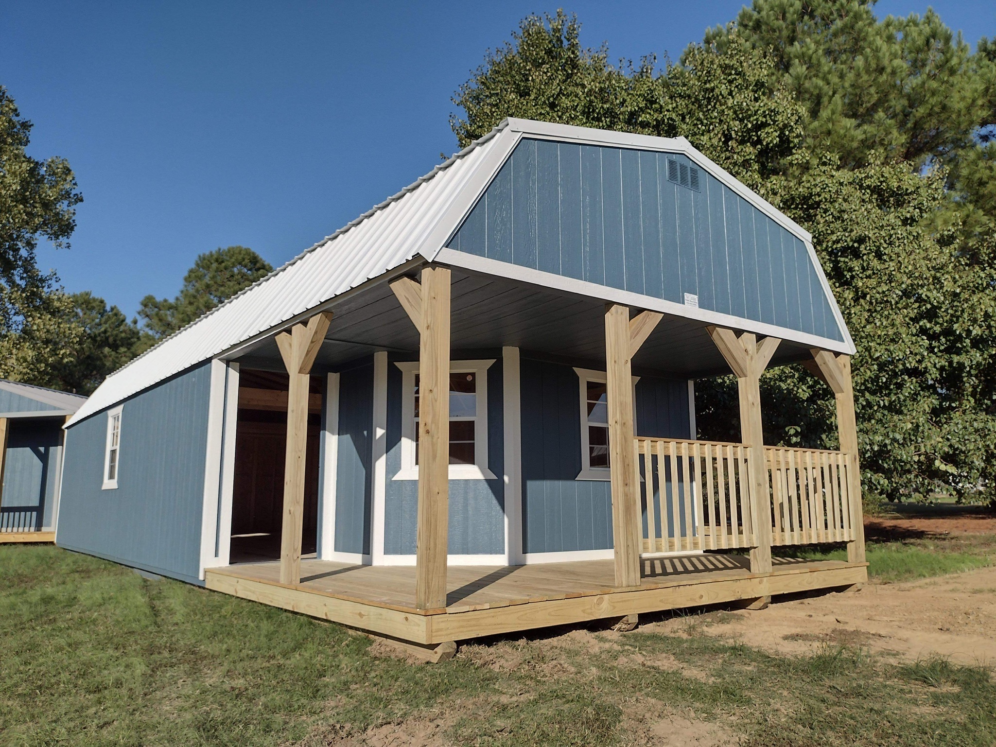 A 12x24 lofted cabin with a porch.