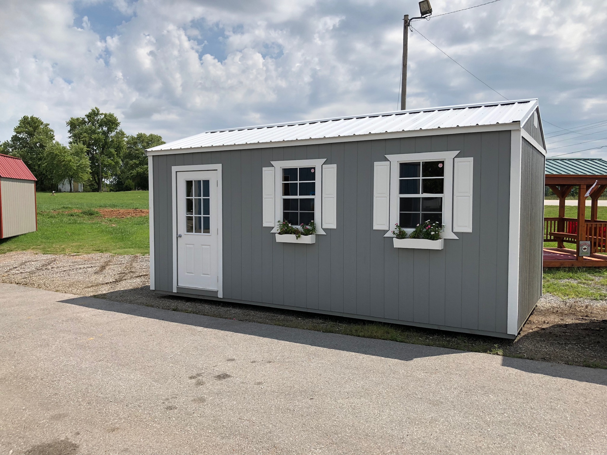 A 12x24 lofted cabin with a porch.