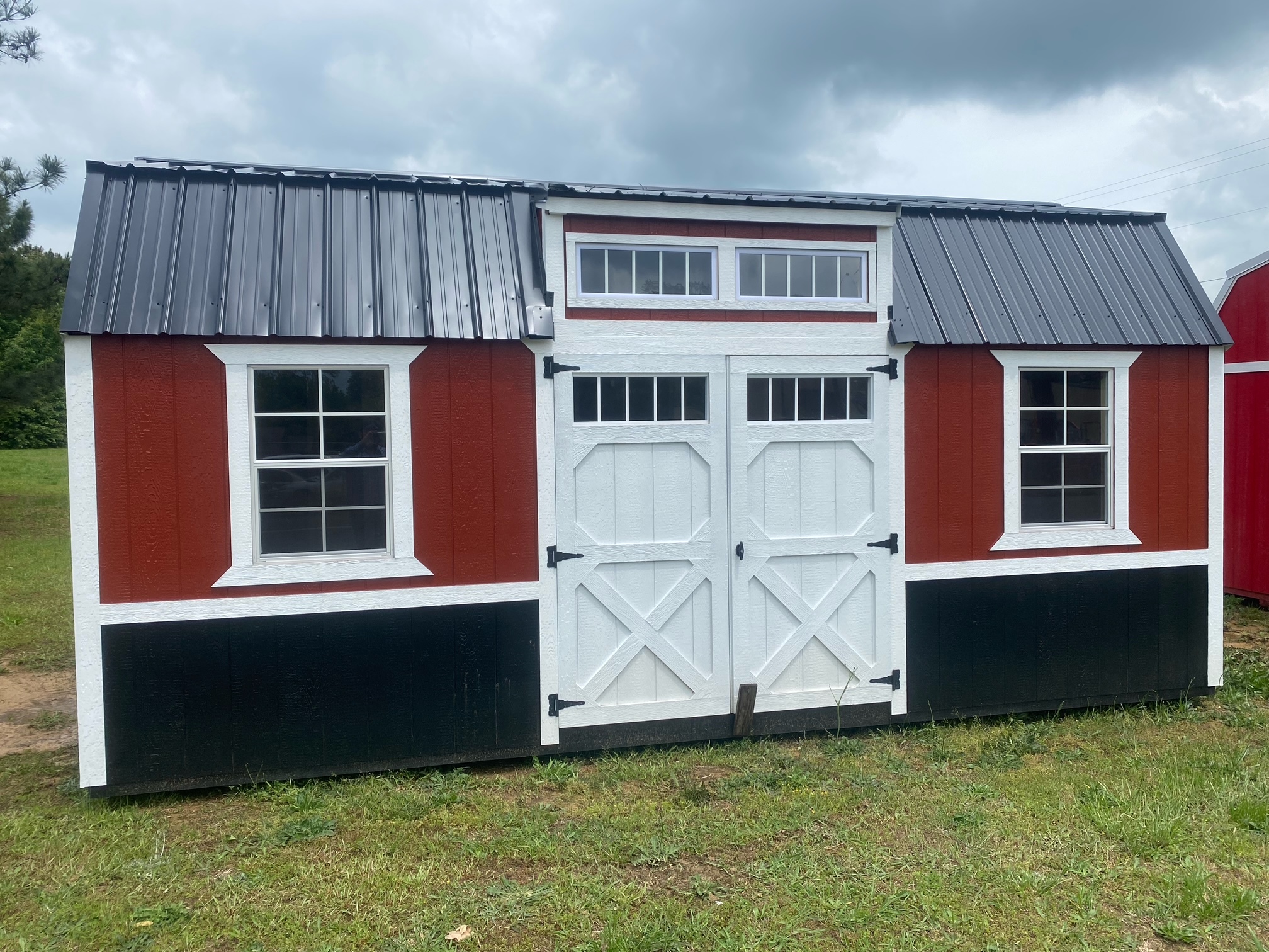A 12x24 lofted cabin with a porch.