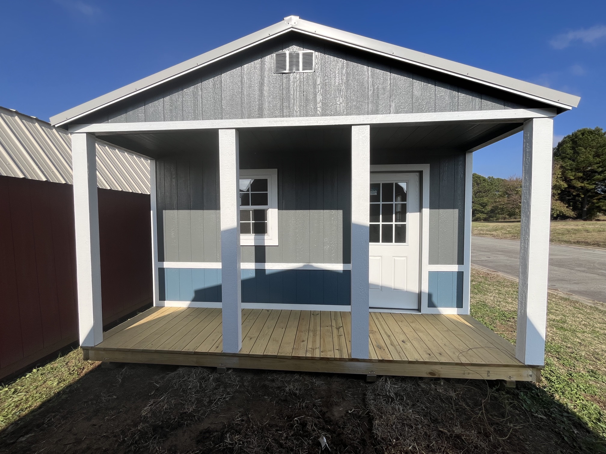 A 12x24 lofted cabin with a porch.