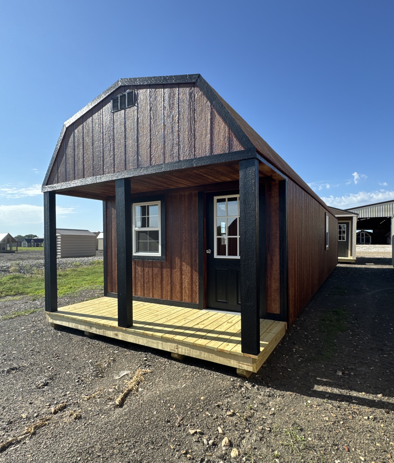 A 12x24 lofted cabin with a porch.