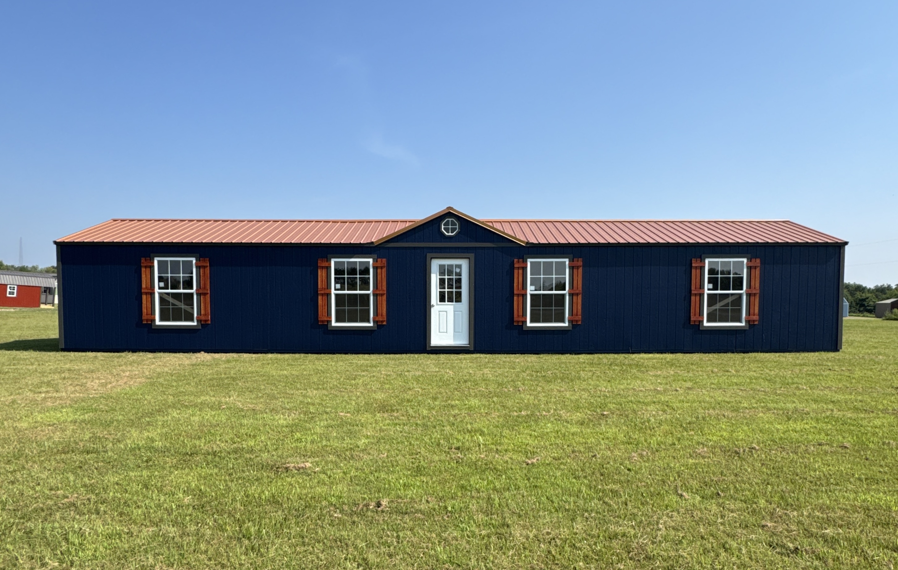 A 12x24 lofted cabin with a porch.