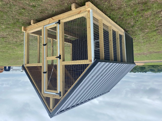 A 12x24 lofted cabin with a porch.