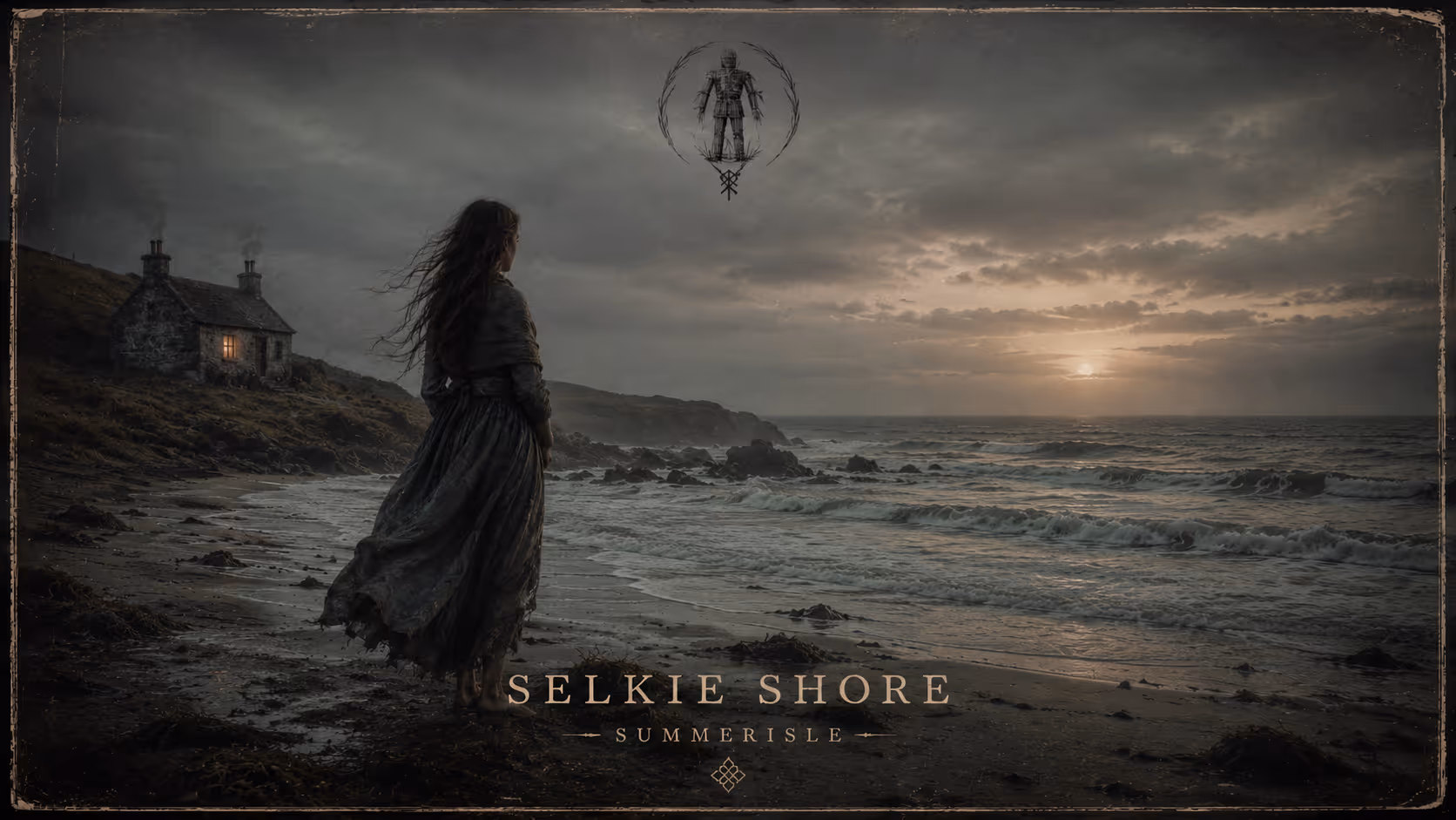 Woman in old dress stands on rocky beach at sunset with a lit stone cottage on hillside.