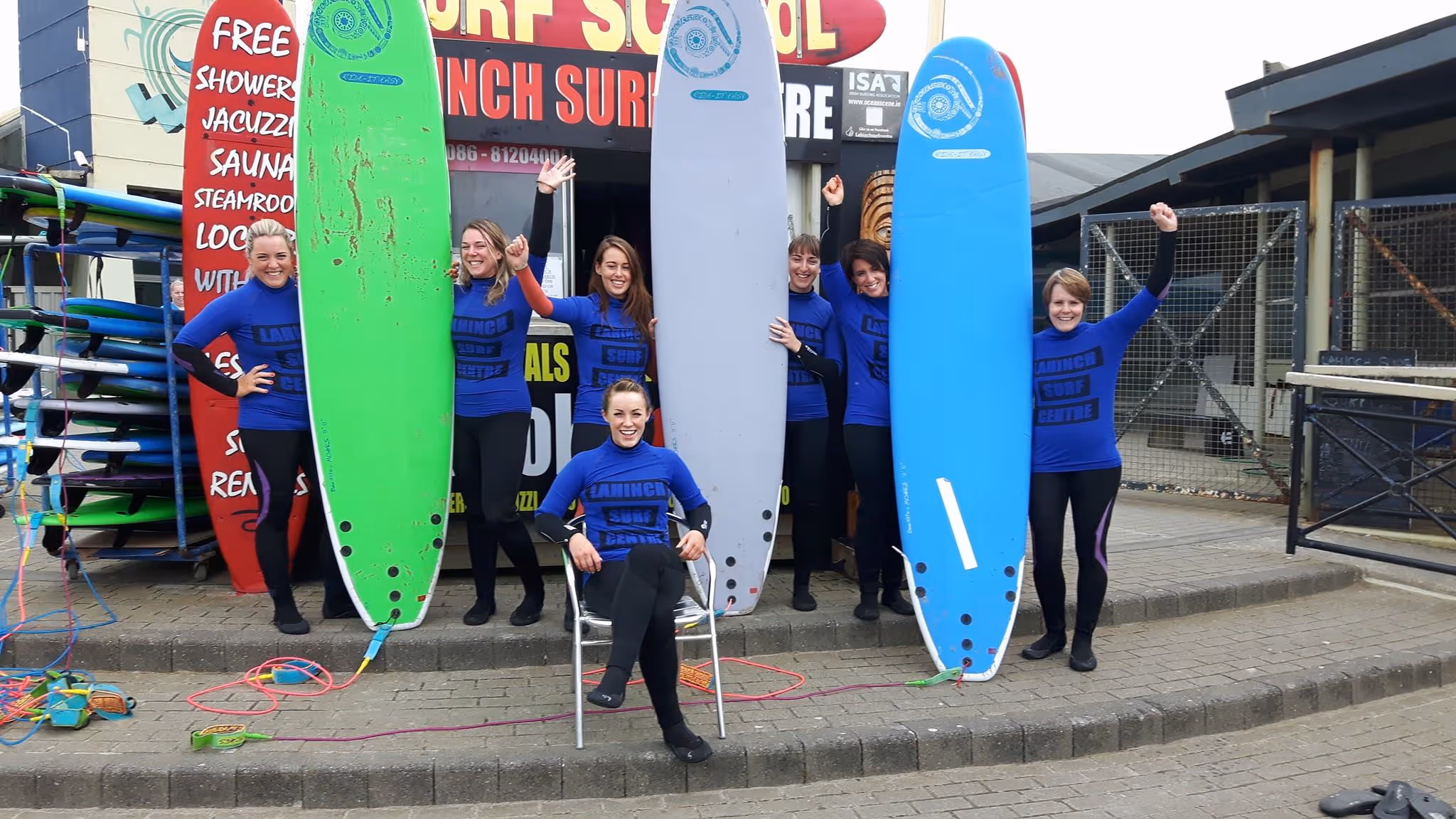 Ollie's Surf School on Lahinch beach men and women learning to surf