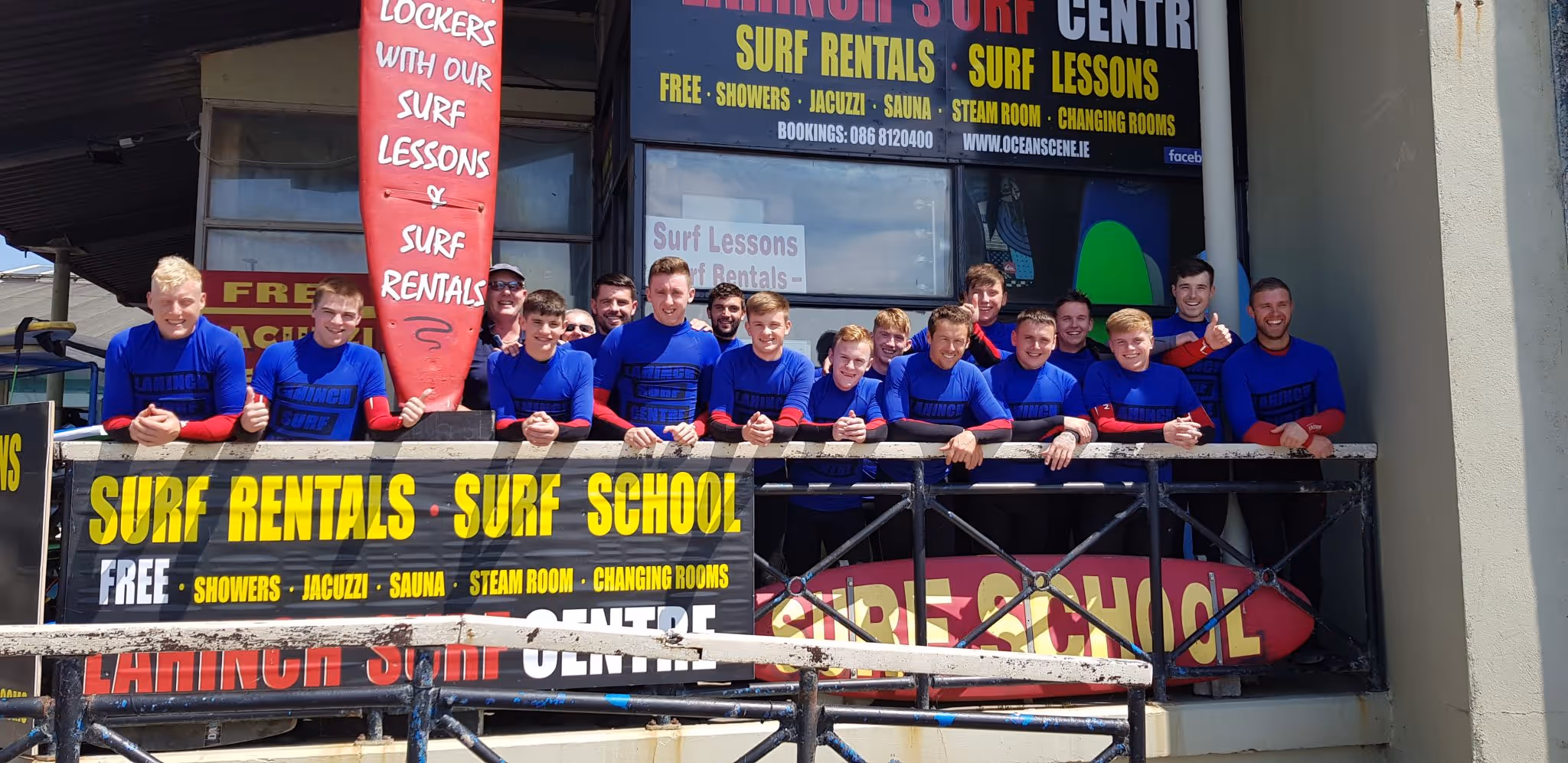Ollie's Surf School on Lahinch beach men and women learning to surf