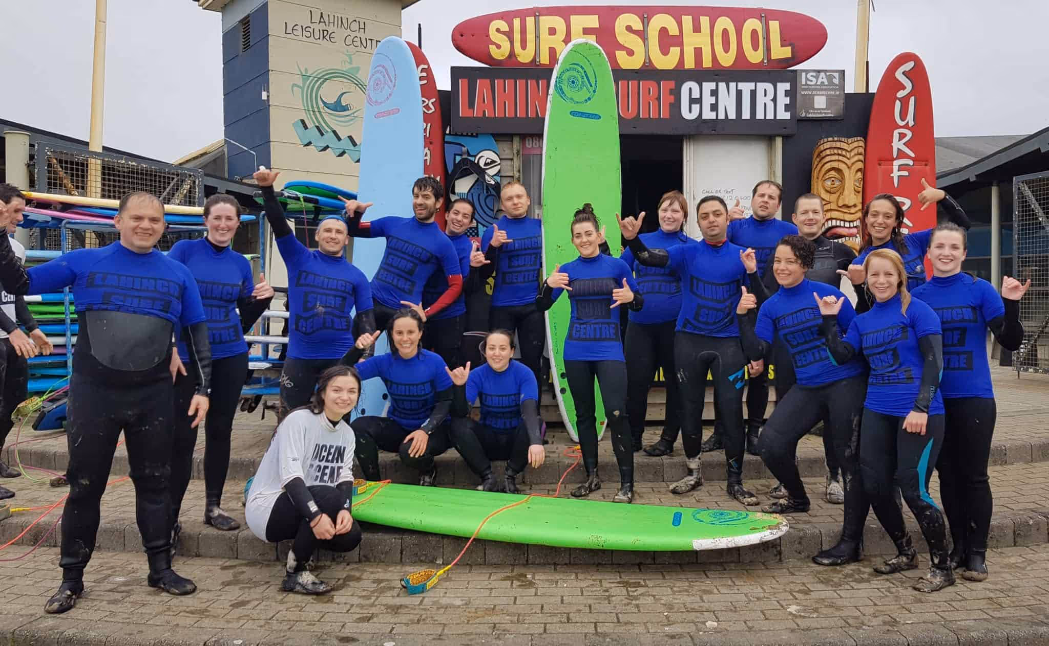 Ollie's Surf School on Lahinch beach men and women learning to surf