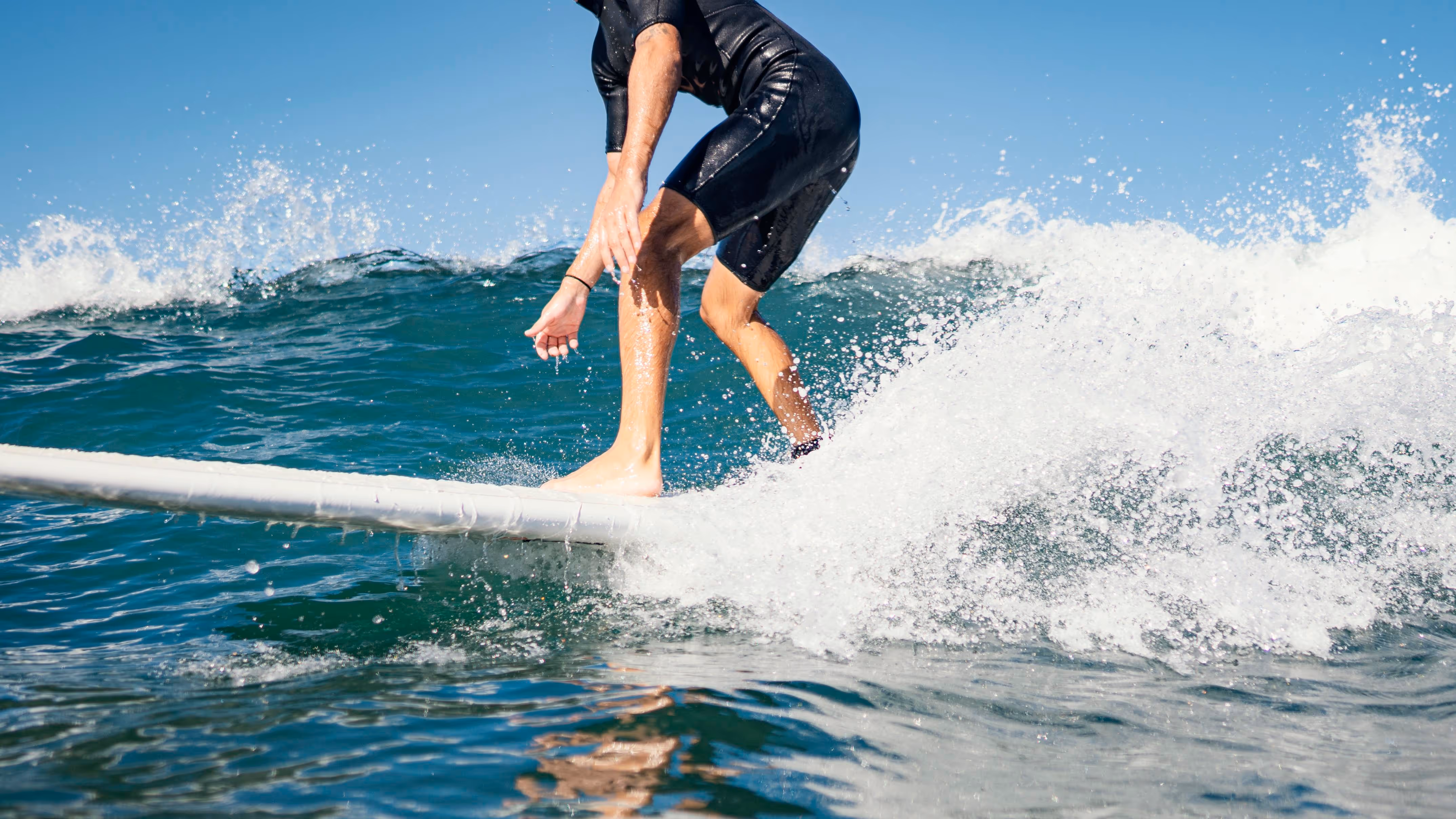 Ollie's Surf School on Lahinch beach men and women learning to surf