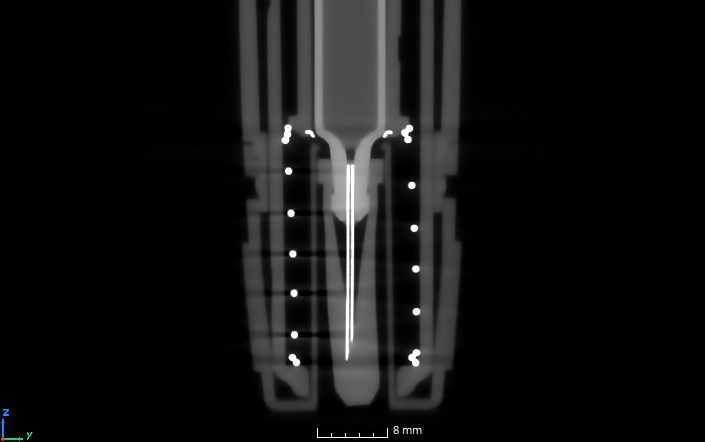A CT scan of a drug delivery device focusing on the needle within