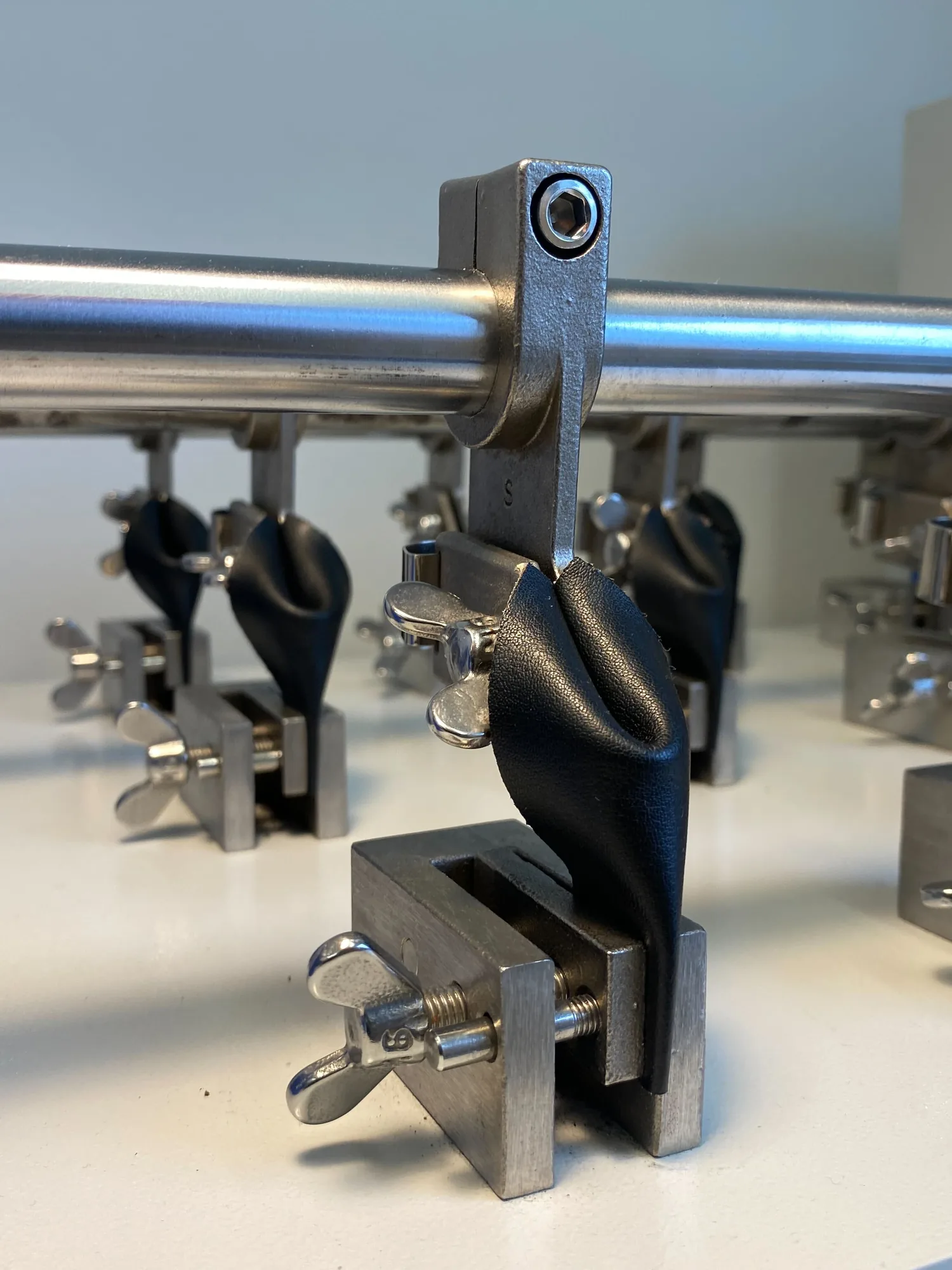 Leap samples clamped for abrasion and durability testing