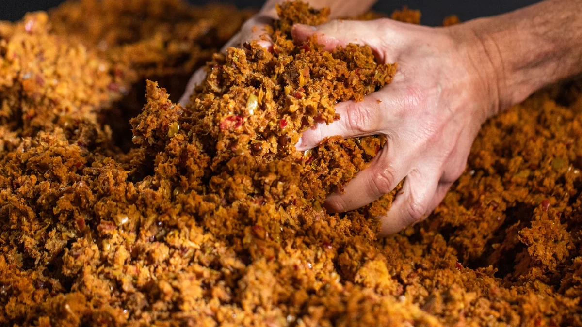 Apple pulp, the base material Leap is made from, held in two hands