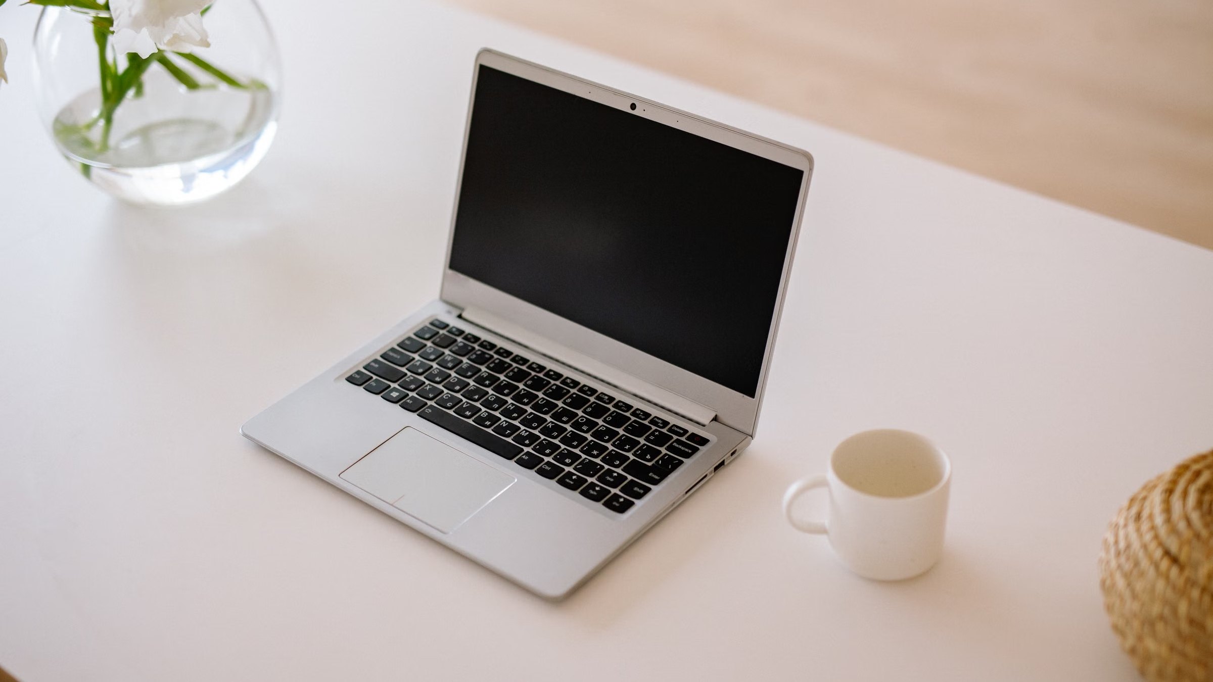 Open laptop on a bright desk