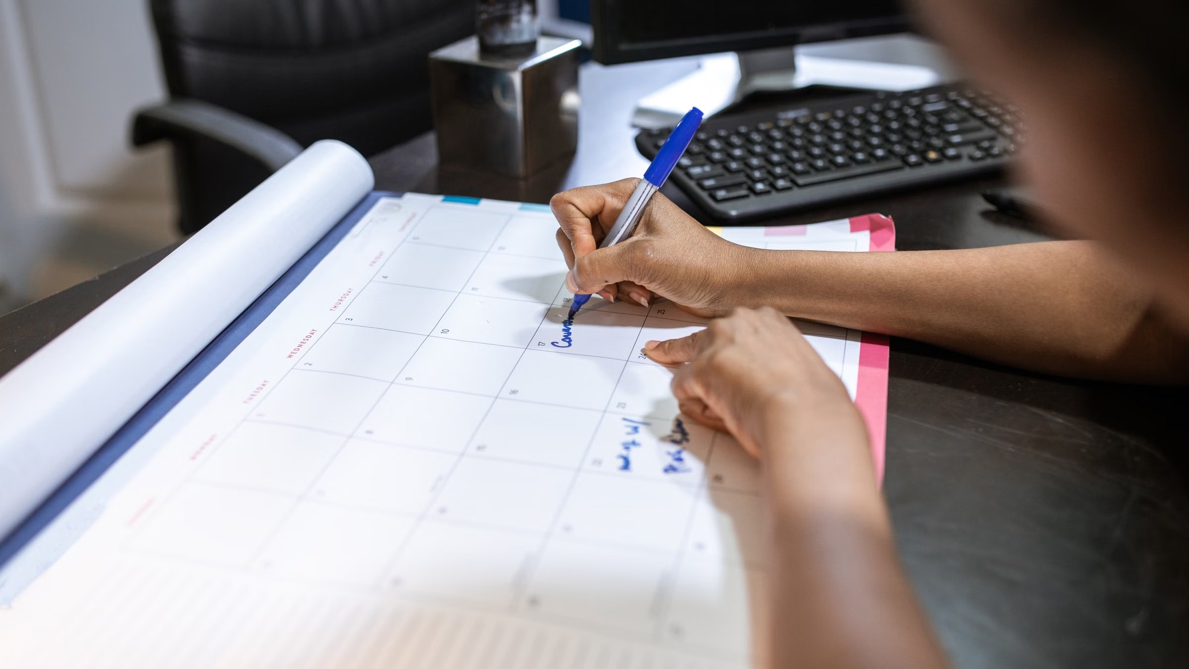Planning appointments on a desk calendar