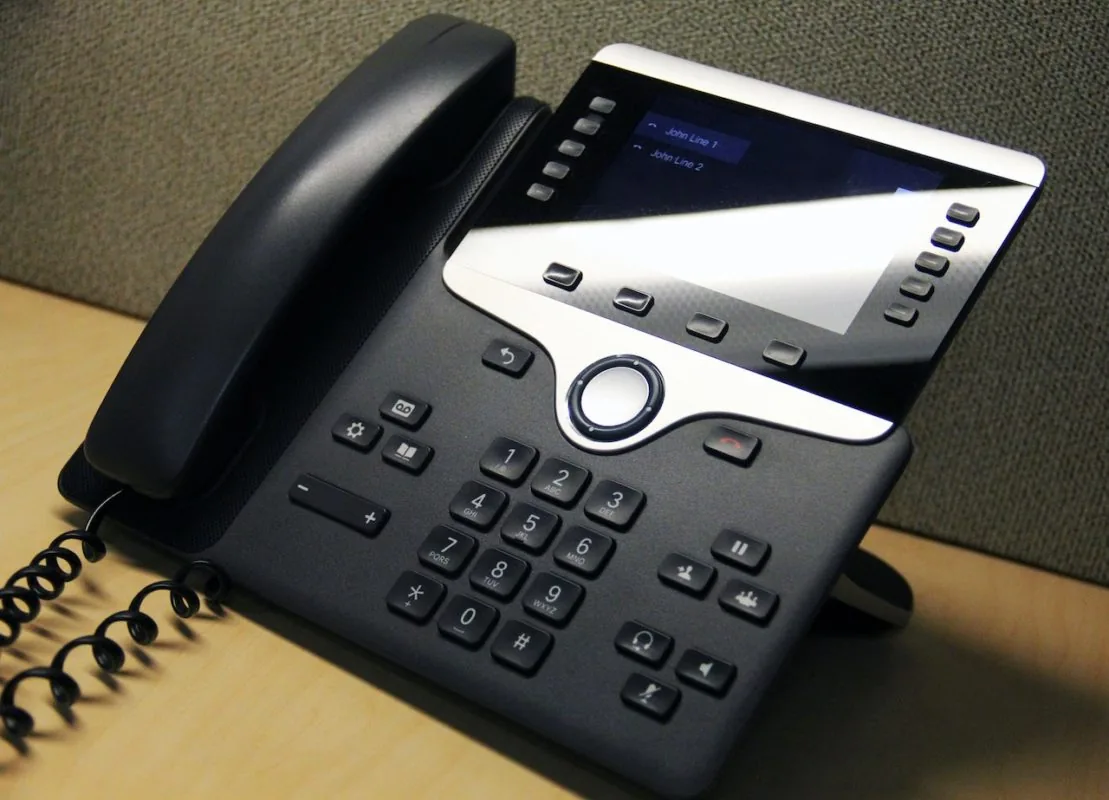 Business desk phone during a corporate call