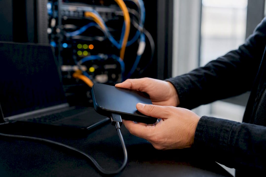 Hands operating backup storage device