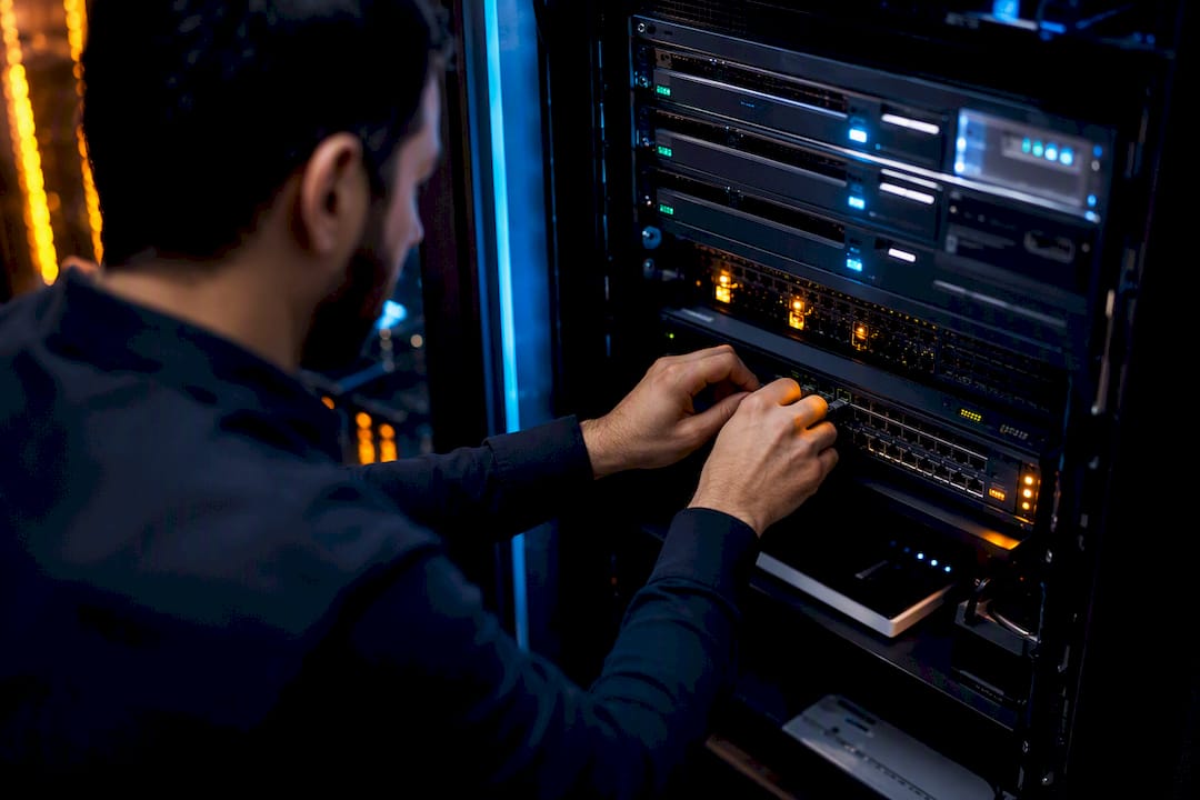 Hands configuring network hardware ports