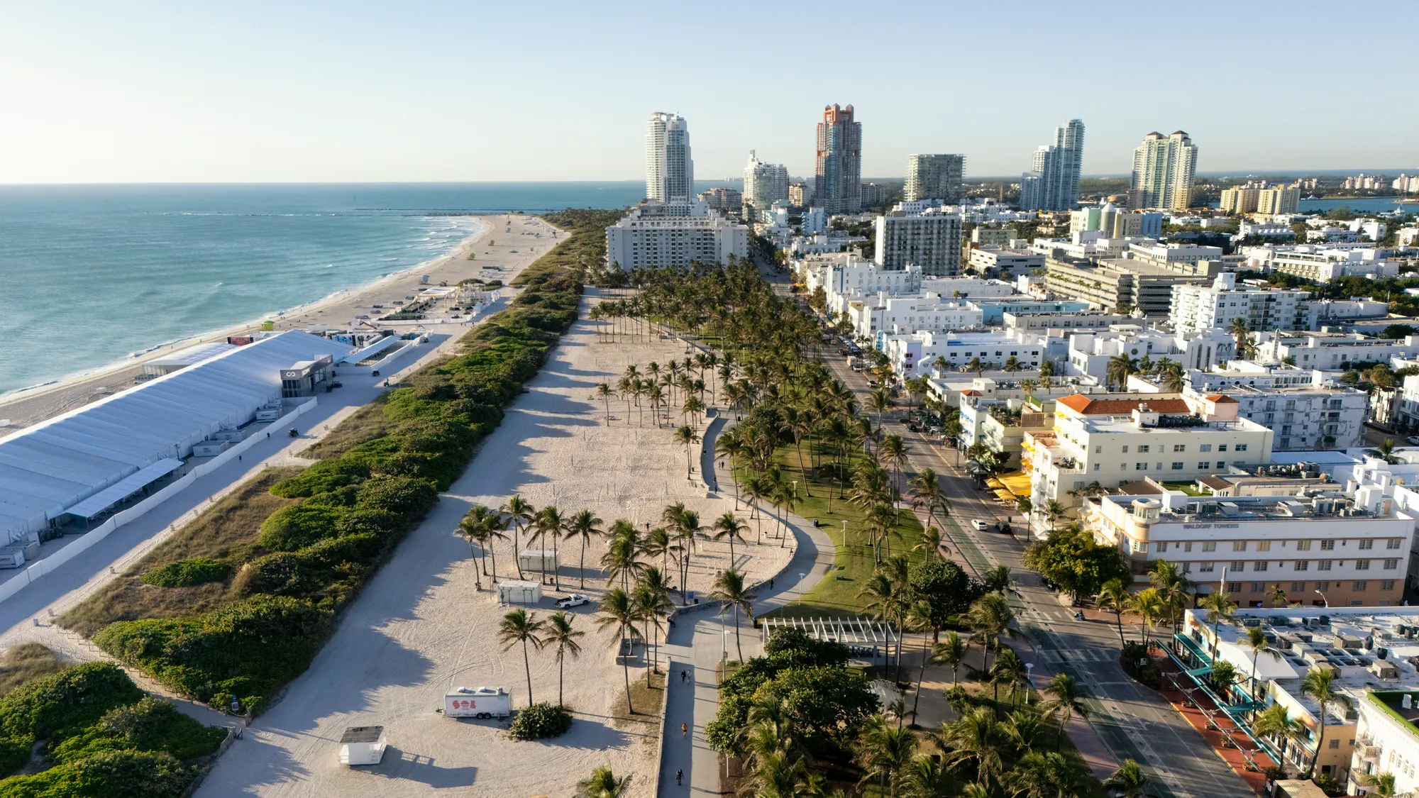An illustration of two older adults getting into a car