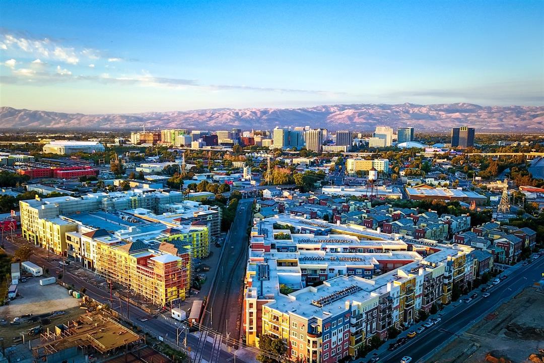 An illustration of two older adults getting into a car