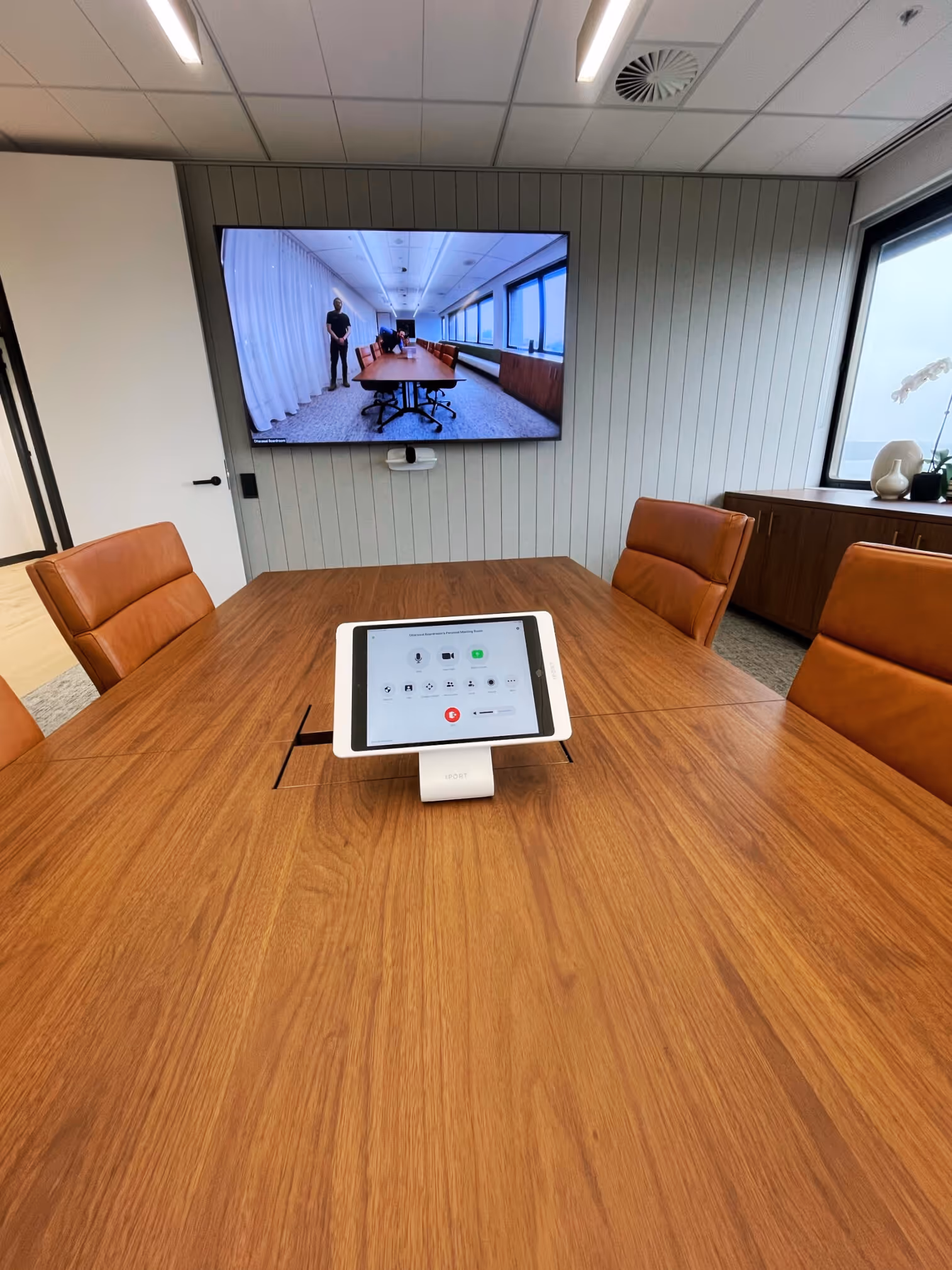 Large Zoom Room Boardroom conference room utilising components from biamp, Poly, Crestron and Apple