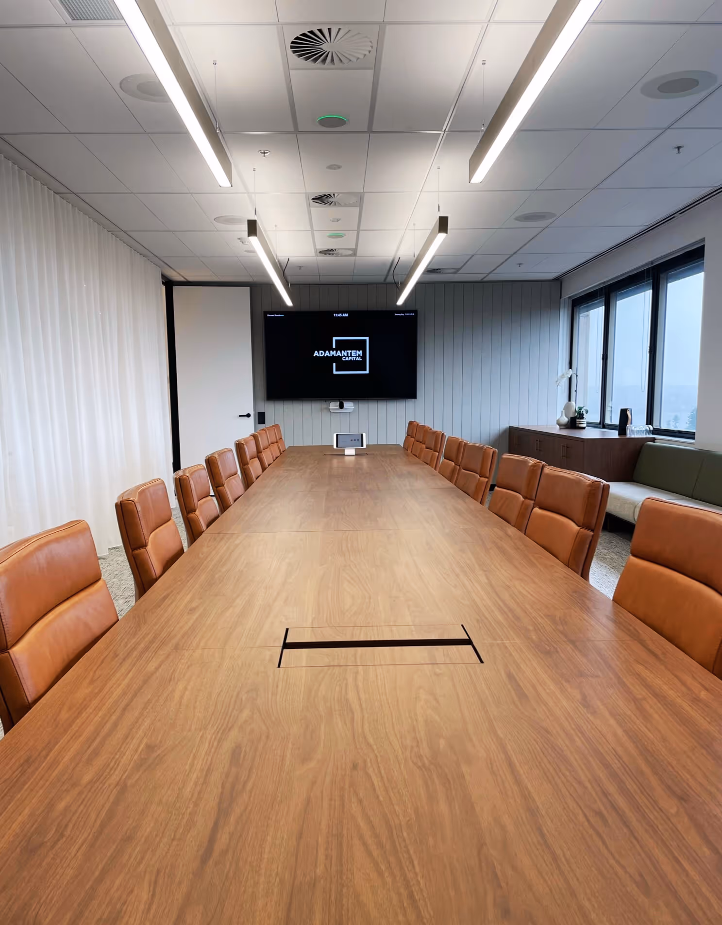 Large Zoom Room Boardroom conference room utilising components from biamp, Poly, Crestron and Apple