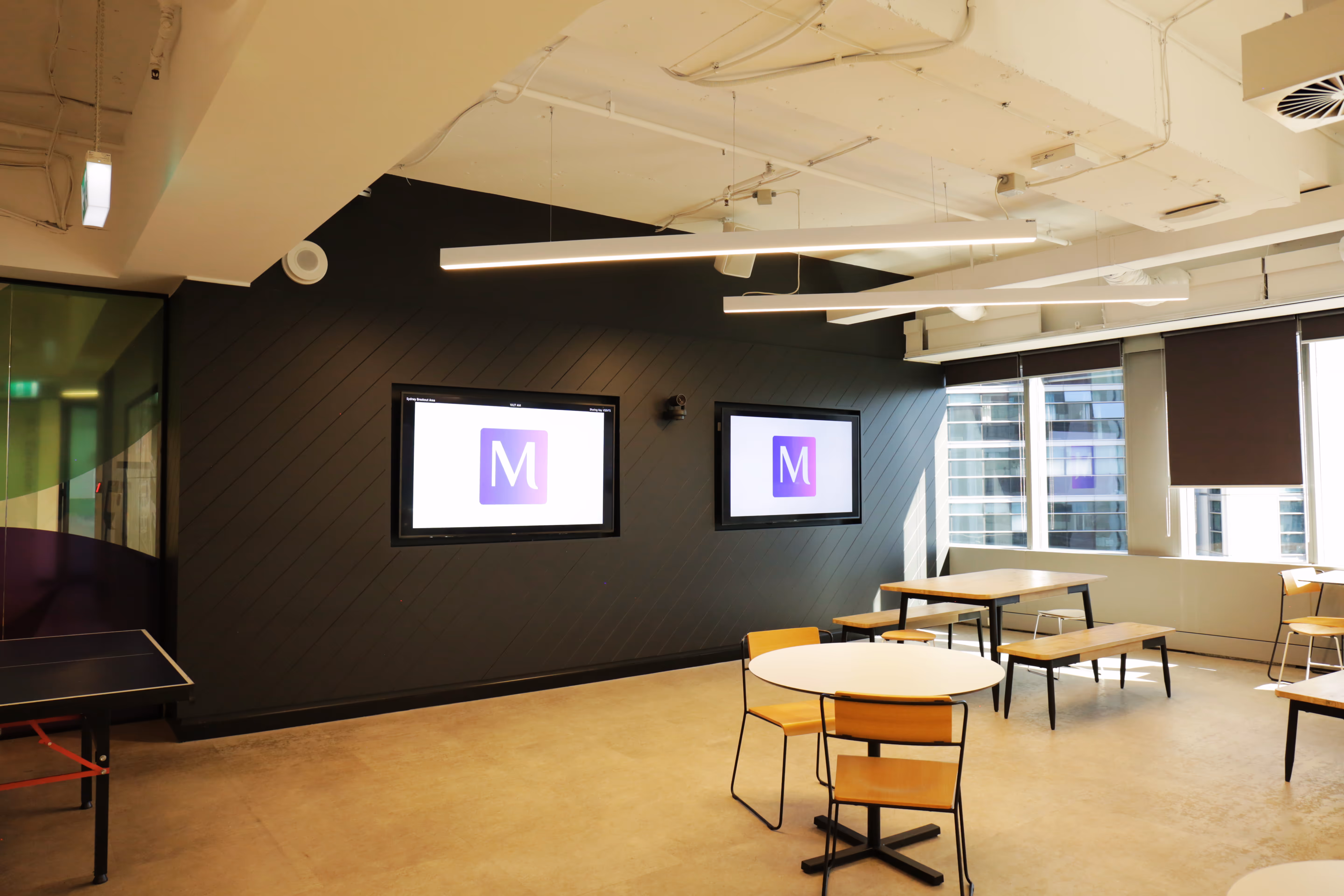 Zoom Room Town Hall space utilising Logitech, Crestron, biamp and Shure components