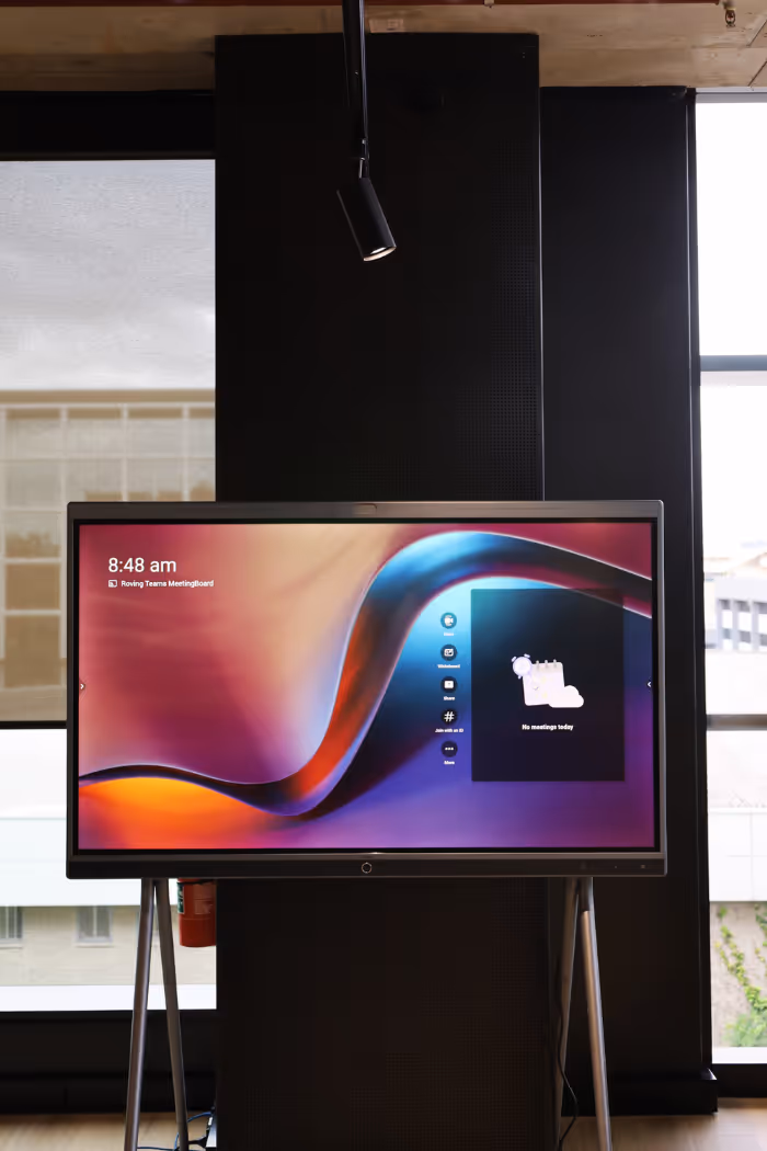 A mobile touchscreen Microsoft Teams Room using the Yealink MeetingBoard.